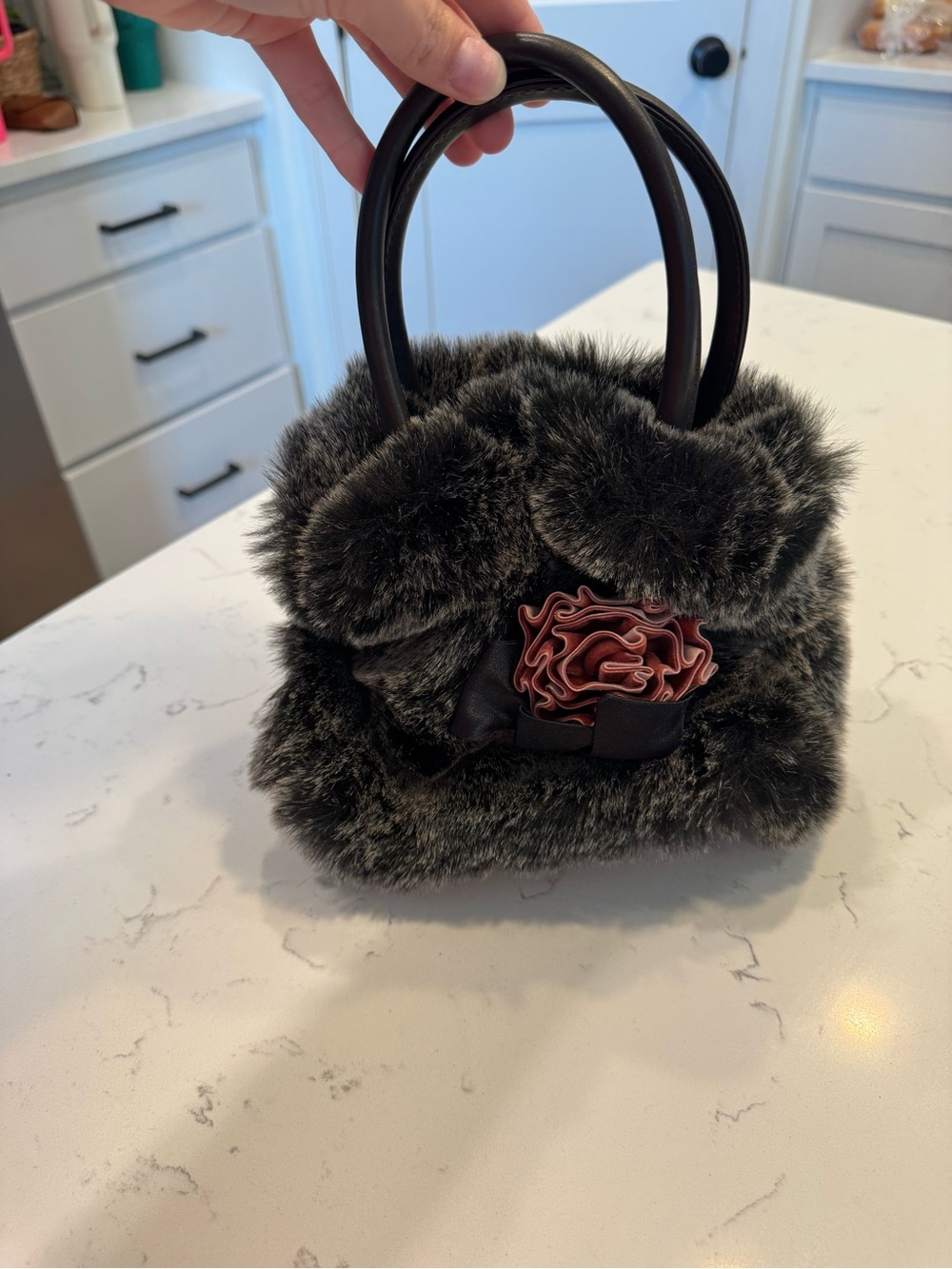 Gioe brand leather and faux fur purse with velvet rosette